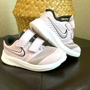 Purple and black Nikes size 5 for toddlers